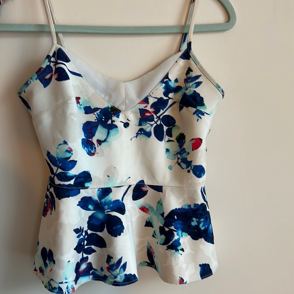White and blue floral peplum tank top/blouse, women’s size XS